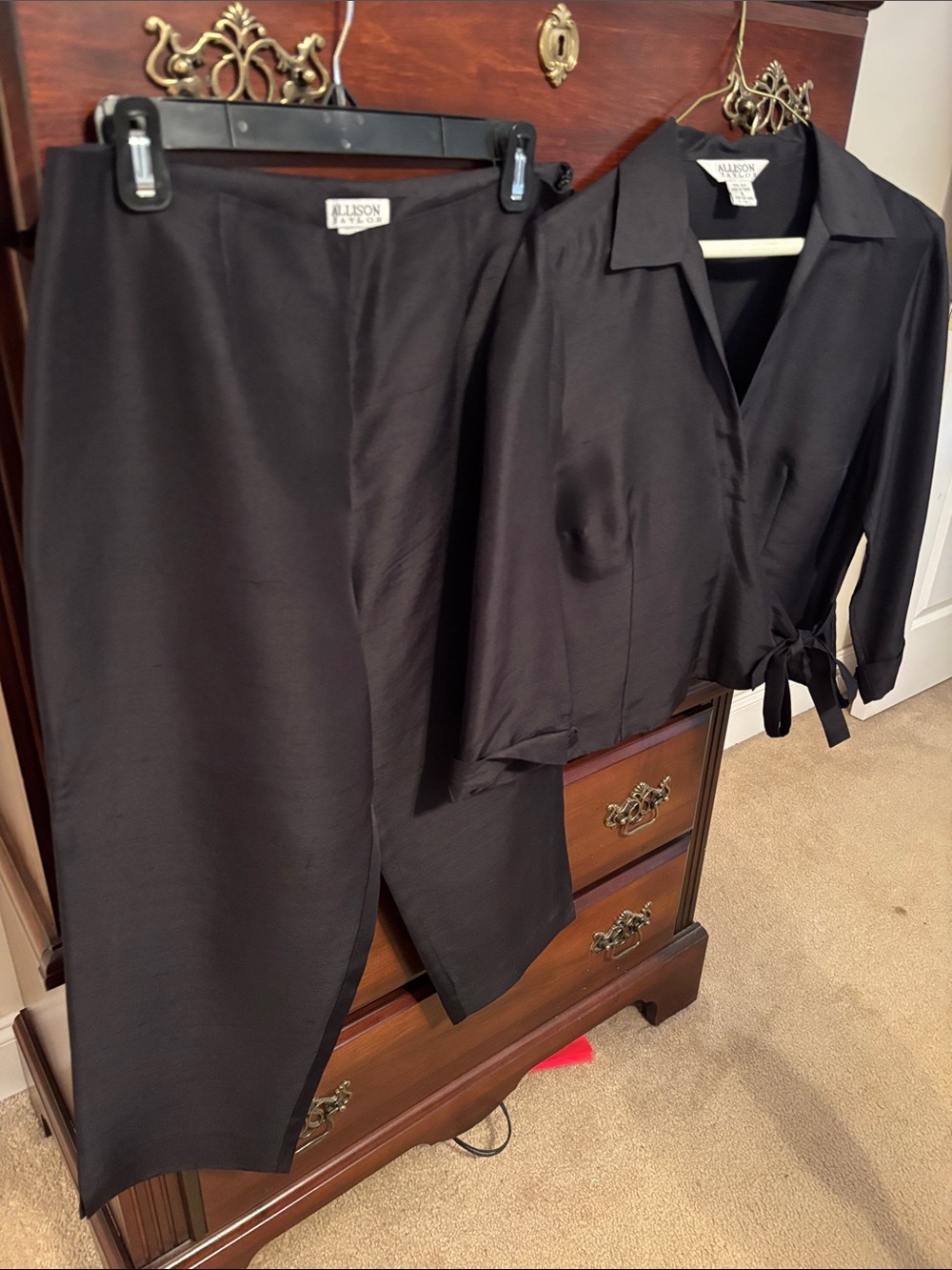 Allison Taylor Black Silk wrapped top and cropped pants.